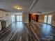 Open living space with hardwood floors and fireplace at 108 Davis Rd, Shelby, NC 28152