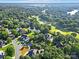 Aerial view showcasing home's desirable location near golf course at 10811 Old Tayport Pl, Charlotte, NC 28277