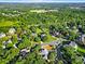 Suburban neighborhood with lush green space at 10811 Old Tayport Pl, Charlotte, NC 28277