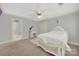 Bright bedroom with double bed, ensuite bathroom access, and ample closet space at 10811 Old Tayport Pl, Charlotte, NC 28277
