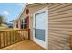 Home featuring a wooden porch, siding and red window shutters at 1106 Safeway Dr, Gastonia, NC 28056