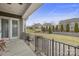View of a backyard featuring a patio, landscaped yard, and retaining wall at 11223 Wescott Hill Dr, Huntersville, NC 28078
