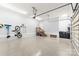 Spacious garage with epoxy floors, utility sink, storage, and bike racks at 117 Yellow Jacket Cir, Mooresville, NC 28117