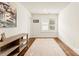 Bright office with a large window, hardwood floors, and neutral walls at 117 Yellow Jacket Cir, Mooresville, NC 28117