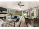 Outdoor space that includes a seating area, fireplace, and a view of the pool at 117 Yellow Jacket Cir, Mooresville, NC 28117