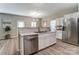 Kitchen with stainless steel appliances and modern faucet at 129 Woodbridge Cir, Mount Holly, NC 28120