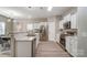 Spacious kitchen with stainless steel appliances and adjacent dining area at 129 Woodbridge Cir, Mount Holly, NC 28120