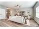 Inviting living room with ceiling fan, hardwood floors, modern decor, and an open layout at 129 Woodbridge Cir, Mount Holly, NC 28120