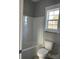 Clean bathroom with a shower/tub combo and a window for natural light at 1526 W Horah St, Salisbury, NC 28144