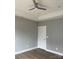 Simple bedroom with hardwood floors and ceiling fan at 1526 W Horah St, Salisbury, NC 28144