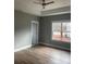 Spacious bedroom with hardwood floors and ceiling fan at 1526 W Horah St, Salisbury, NC 28144