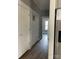 Bright hallway with hardwood floors and access to bedrooms at 1526 W Horah St, Salisbury, NC 28144