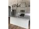 Modern kitchen features granite countertops, stainless steel appliances, and an island at 1526 W Horah St, Salisbury, NC 28144