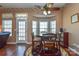 This breakfast nook is bright, with a door to the outside and seating for four at 157 Red Tip Ln, Mooresville, NC 28117