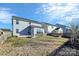 Spacious backyard with a fire pit and views of neighboring houses at 1686 Scarbrough Sw Cir, Concord, NC 28025
