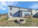 Home's spacious backyard and fire pit at 1686 Scarbrough Sw Cir, Concord, NC 28025