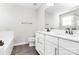 Bright bathroom features double sink vanity with quartz countertop, soaking tub, and bronze fixtures at 1686 Scarbrough Sw Cir, Concord, NC 28025