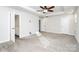 Large bedroom featuring a ceiling fan, a walk in closet and neutral decor at 1686 Scarbrough Sw Cir, Concord, NC 28025