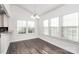 Bright dining area with multiple windows providing ample natural light at 1686 Scarbrough Sw Cir, Concord, NC 28025