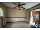 Connected dining area with carpet and light fixtures, leading into the kitchen at 1735 Hollandale Dr, Gastonia, NC 28054