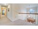 Hallway with carpet flooring and a pendant light fixture at 201 Limerick Dr, Matthews, NC 28104