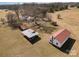 Aerial view of a farm with multiple structures and a large tree at 202 Deitz Rd, Statesville, NC 28625