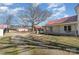 Charming single-Gathering home featuring mature trees, outbuildings and a well at 202 Deitz Rd, Statesville, NC 28625