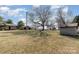Rural property featuring mature trees and multiple outbuildings at 202 Deitz Rd, Statesville, NC 28625