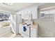 Well-equipped kitchen featuring white cabinets and appliances at 2065 Pin Oak Pl, Cramerton, NC 28032