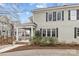 Charming two-story home featuring a covered front porch and well-maintained landscaping at 2128 Greenway Ave, Charlotte, NC 28204