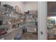 Well-stocked pantry with ample shelving and storage solutions for all your culinary needs and organization at 215 Pintail Dr, Monroe, NC 28110