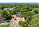Aerial view of two gray, two-story homes featuring modern design, driveway, and landscaping at 2230 Revolution Park Dr, Charlotte, NC 28208