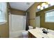 Clean bathroom with tub shower, vanity, and mirror at 234 Candle Nw Ct, Concord, NC 28027