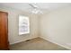 Bright bedroom with ceiling fan and window blinds at 234 Candle Nw Ct, Concord, NC 28027