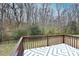 Wooden deck overlooking a wooded backyard at 234 Candle Nw Ct, Concord, NC 28027