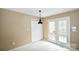 Eat-in kitchen area with French doors leading to deck at 234 Candle Nw Ct, Concord, NC 28027