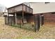 Fenced dog run next to house and deck at 234 Candle Nw Ct, Concord, NC 28027