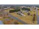 Aerial view of the property showcasing the home, driveway, and surrounding landscape at 2370 Old Mountain Rd, Statesville, NC 28625
