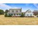 Charming home featuring a welcoming front porch, well-manicured lawn, and classic curb appeal at 2370 Old Mountain Rd, Statesville, NC 28625