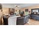 Comfortable living room featuring a brick fireplace, natural light, and a cozy atmosphere at 2370 Old Mountain Rd, Statesville, NC 28625
