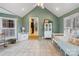 View of bright sunroom featuring light tile floors and neutral walls and ceiling at 2370 Old Mountain Rd, Statesville, NC 28625