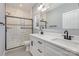 Modern bathroom with double vanity, granite countertop, and tiled walk-in shower at 2385 Kool Park Ne Rd # 2, Hickory, NC 28601