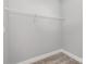 Small walk-in closet with a single, wire shelf in the upper area at 2385 Kool Park Ne Rd # 2, Hickory, NC 28601