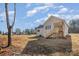 Charming brick home featuring a back deck and a large, grassy yard perfect for outdoor activities and enjoyment at 2385 Kool Park Ne Rd # 2, Hickory, NC 28601