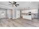 Open-concept kitchen featuring modern white cabinets, stainless steel appliances, and island at 2385 Kool Park Ne Rd # 2, Hickory, NC 28601
