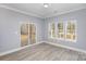 Bright living room with sliding glass doors leading to the deck at 2385 Kool Park Ne Rd # 2, Hickory, NC 28601