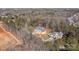 Aerial view of a home and lot in a wooded area at 2418 Lexington Approach Dr, Charlotte, NC 28262