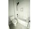Contemporary bathroom featuring a sleek tub and shower combination with black fixtures at 2418 Lexington Approach Dr, Charlotte, NC 28262