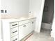 Modern bathroom with a double vanity, sleek countertops, and a bathtub, providing a luxurious and functional space at 2418 Lexington Approach Dr, Charlotte, NC 28262