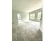 Spacious bedroom with plush carpet and natural light from double windows at 2418 Lexington Approach Dr, Charlotte, NC 28262